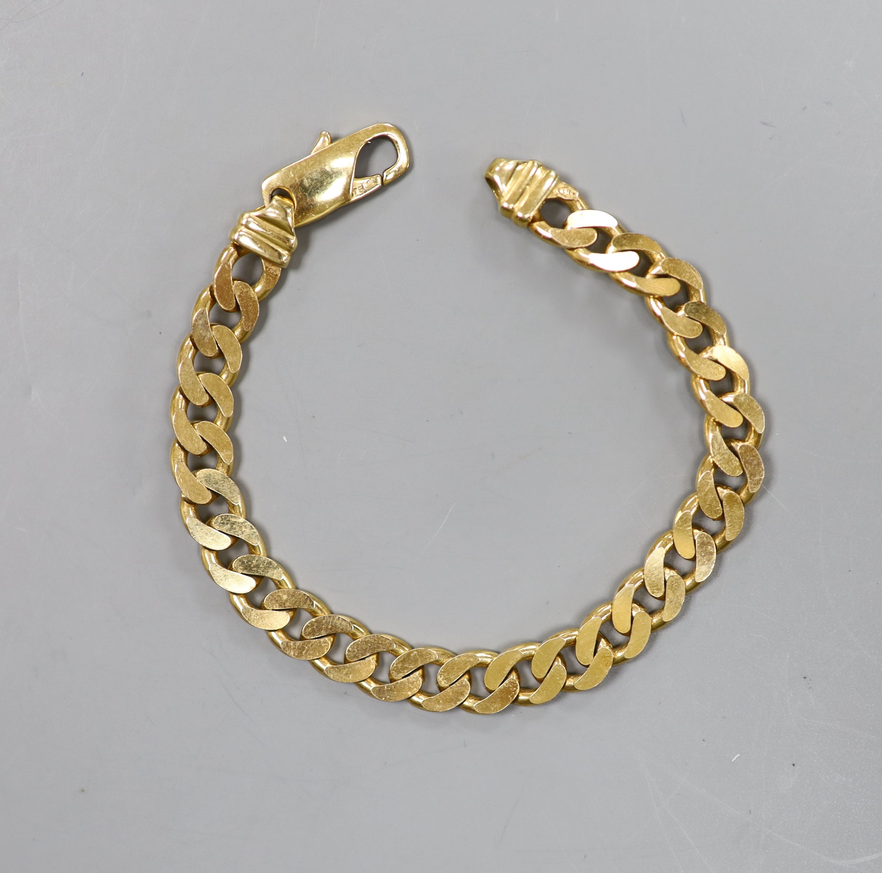 A 9ct gold curb-link bracelet with trigger clasp, 25.8g